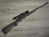Anschutz 22 Petite carabine  verrou d'Anschutz, sans prtention, avec magasin en 22LR, crosse en bois, pas de vis  l'avant du canon, carabine avec une petite lunette Simons...