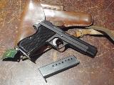 SIG P210 P210, simple action, verrou du magasin au talon de la crosse, organes de vise fixes, deuxime magasin et tui cuir...