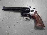 Smith & Wesson 17-4 Joli revolver de tir de loisir, six coups en 22lr, canon de 6 pouces, crosse en bois, double action, détente large, chien large et visée...